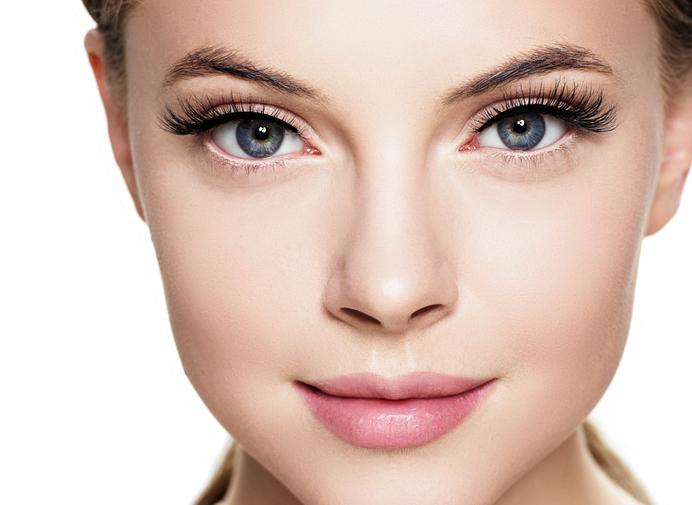 Beautiful woman face with eyelashes beauty healthy skin natural makeup. Studio shot.
